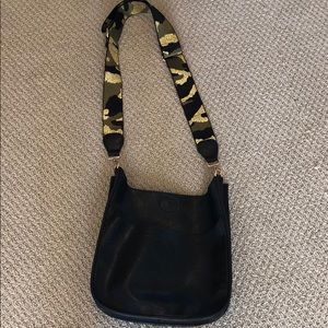 Vegan messenger bag with camo strap
